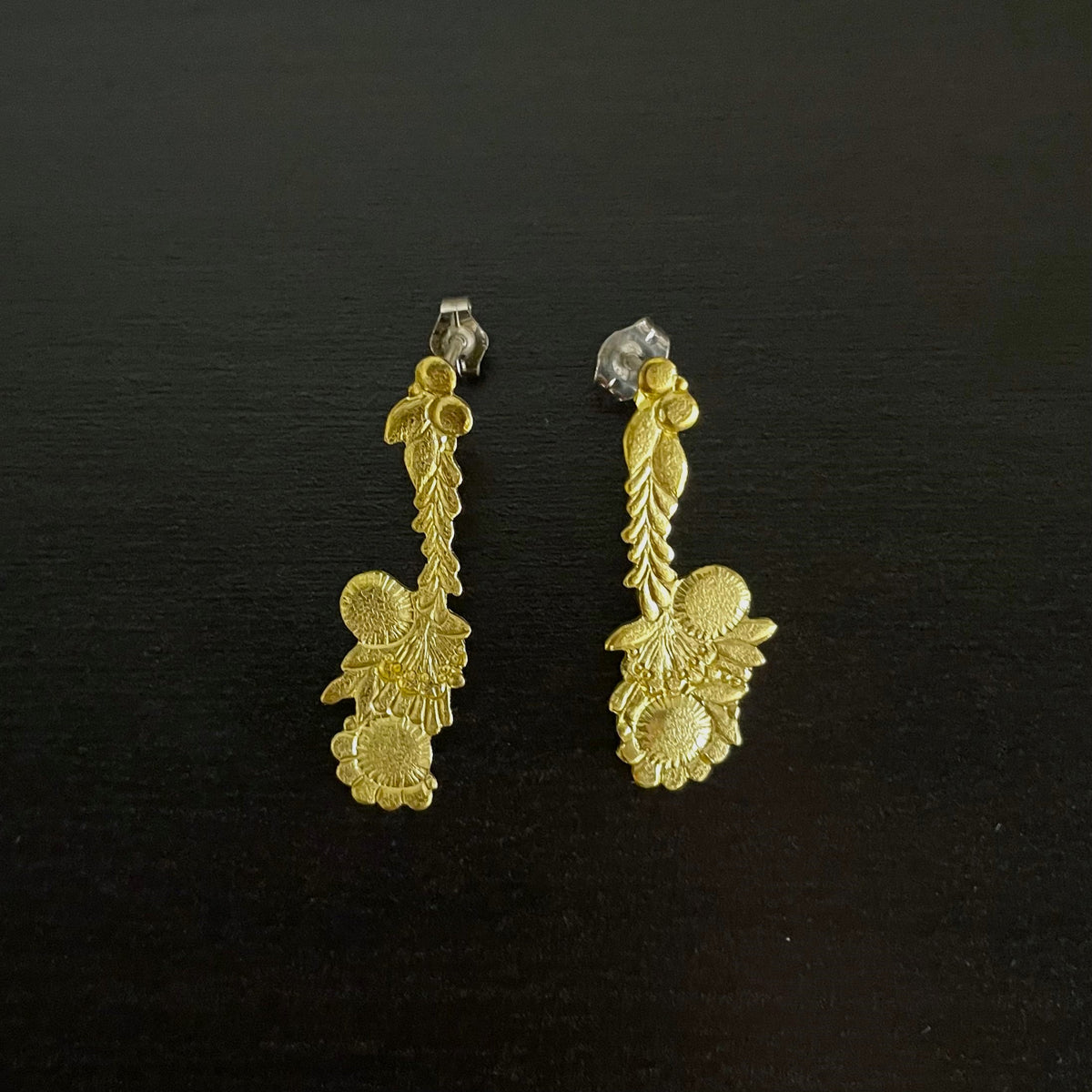 Piercing Flowers in row